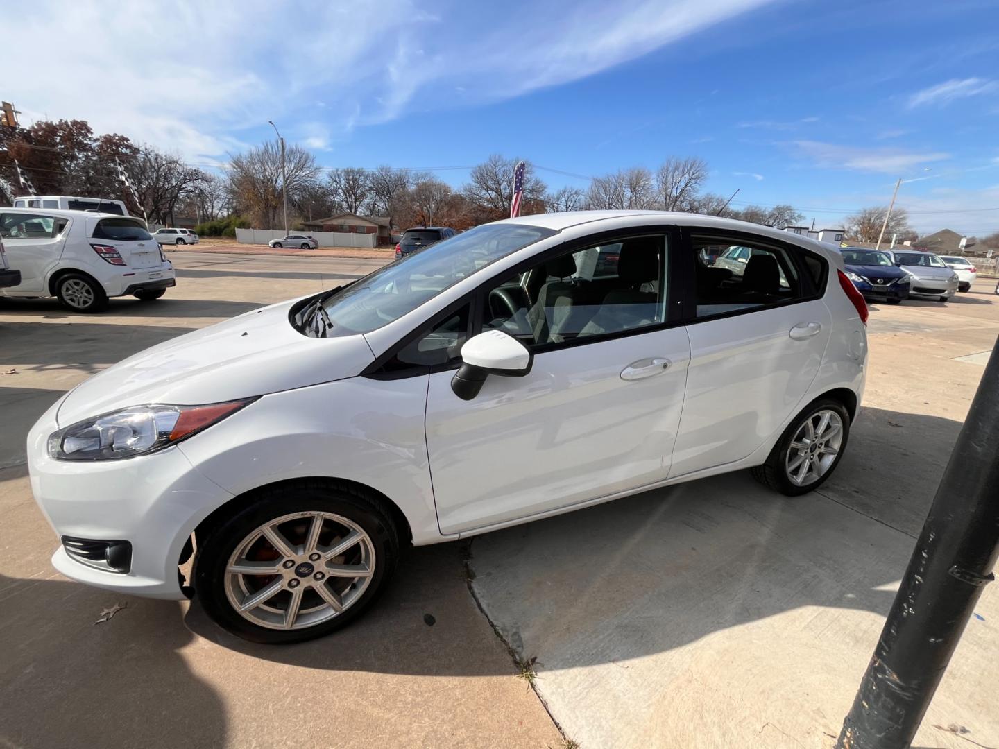 2019 WHITE FORD FIESTA SE SE Hatchback (3FADP4EJ2KM) with an 1.6L L4 DOHC 16V engine, located at 8101 E. Skelly Dr., Tulsa, OK, 74129, (918) 592-3593, 36.121891, -95.888802 - Photo#2